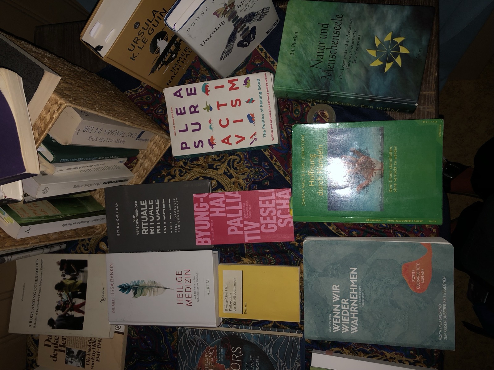 A stack of books from the working library, including titles on ritual, hope and civic education